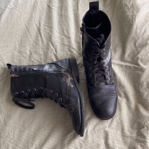 very dirty black combat boots